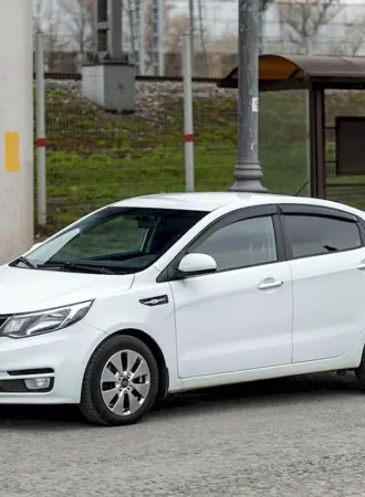 Kia Rio III Рестайлинг 1.4 at 100 л.с белый